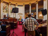 Sen. Spreitzer is interviewed by national media in the Senate Chamber.