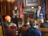 Sen. Spreitzer and Rep. Conley speaking with constituents in the Senate Parlor.