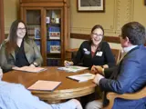 Sen. Spreitzer speaks with constituents in his Capitol office. 
