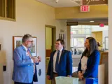 Sen. Spreitzer and Rep. Jacobson speak with a constituent at Edgerton Hospital. 