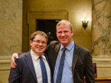 Sen. Spreitzer and his husband Philip in the Senate Chamber. 