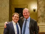 Sen. Spreitzer and his husband Philip in the Senate Chamber.