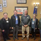 Senator Smith posing with members of the Wisconsin Library Association during their Capitol visit.