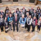 Senator Smith posing with members of the Wisconsin Credit Union League in the Capitol rotunda on their lobby day.