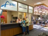 Photo of people at the entrance for the Aging and Disability Resource Center.