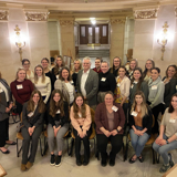 Posed photo of Senator Smith with members of the Wisconsin Nurses Association in the capital.